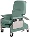 Lumex Deluxe Clinical Care Recliner with Drop Arms: Meets California Technical Bulletin 133 Flammability Standards Imperial Blue Innovative, easy to actuate drop arm feature. Self storing drop arm is simple for the caregiver to activate and enables a safer, easier lateral transfer for the resident and caregiver. &bull; Innovative, easy to actuate drop arm feature. Self-storing, dual drop arms are simple for the caregiver to activate and enables a safer, easier lateral transfer for the resident and caregiver.&bull; The unique, patent pending recliner mechanism enables the patient to position the back infinitely from TV position to full recline. The wide, contoured seat and back, along with an integrated footrest provide an enhanced level of comfort. Built-in arm pads in the back give improved support for the arms while in Trendelenburg. Wall saver armrest caps increase durability of the armrests and protect walls from marring&bull; Easy to achieve Trendelenburg position. No more cables or handles, Trendelenburg position can be actuated from either side of recliner by a convenient foot pedal. Higher floor to back height enables the caregiver to raise the patient up with less effort reducing the chance for a back injury.&bull; Extra deep Trendelenburg position-Steeper angle improves patient stabilization.&bull; Easily removed &ldquo;pop-out&rdquo; side panels enable easy access to recliner for cleaning and maintenance.&bull; Four Tente® swivel casters facilitate transport and maneuverability in confined areas. Left and right rear top locking casters provide positive lock. Directional wheel lock on right rear caster reduces &ldquo;crabbing&rdquo; of recliner and enables the chair to be moved down hallways with less effort.&bull; Durable, high impact side tables sit flush with chair arm to conveniently hold prep materials. Easy to actuate by caregiver.&bull; Extra heavy duty recliner mechanism is thicker than standard mechanism-Weight bearing capacity: 350 Pounds.&b
