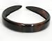 Hair Band 3/4'' Tort Band 1 inch hard plastic headband in tortis shell finish. Featured with a full comb on the inside for full comfort and great fit. Made in France
