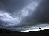An afternoon thunderstorm coming through the Flint Hills Photographic Poster Print by Jim Richardson, 30x40