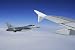Wallmonkeys Peel and Stick Wall Decals - A F-16 Jet Fighter from the Portuguese Air Force Flys alongside an Airbus A320. - Removable Graphic