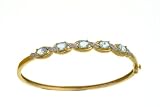 Ladies' Diamond and Blue Topaz Bangle, 9ct Yellow Gold, Prong Setting 0.05 Carat Diamond Weight, Model PBC1838