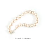 Single Strand 7-7.5 Inch 8MM Pink Shell Pearl Bracelet
