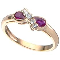 Eighteen Carat Gold Diamond and Ruby Crossover Ring