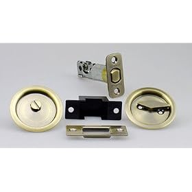Kwikset 93350-013 Privacy Pocket Door Lock - Antique Brass