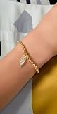 Accessories & Beyond Pebble Braclet with Wing Charm