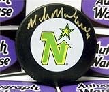Mike Modano autographed Hockey Puck (Minnesota North Stars)