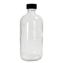 Qorpak Clear Glass Boston Round Bottle with Black Phenolic Polyseal Cone Lined Cap