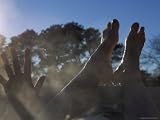 Woman in Outdoor Hot Tub, Hans and Feet Sticking Out of Tub Photographic Poster Print, 24x18