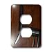 Jos Fauxtographee Conceptual - A Black Leather Chair that Appears to be Hanging On The Wall of Brown Hardwood kind of Tilted - Light Switch Covers - 2 plug outlet cover