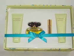 Covet By Sarah Jessica Parker 4 Piece Set: 3.4 Oz Eau De Parfum Spray + 2.5 Oz Rich Body Lotion + Luxirious Shower Gel + 4ml Eau De Parfum Travel Spray