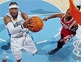 Allen Iverson (Denver Nuggets) autographed 16x20 photo action