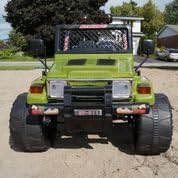 Green Battery Operated Ride on Jeep Raptor with Remote Control