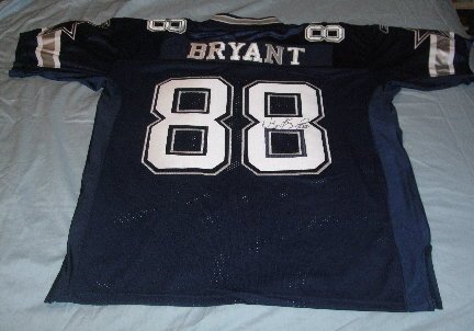 Dez Bryant Autographed Dallas Cowboys Blue Jersey W/PROOF, Oklahoma State Cowboys, Picture of Dez Signing the Jersey