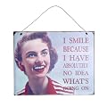Vintage Metal Wall Plaque / Sign - ''I smile because I have absolutely no idea what's going on"