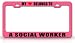 MY HEART BELONGS TO A SOCIAL WORKER Occupation Metal Auto License Plate Frame Tag Holder, Pink/Black
