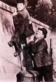 130-181 - Laurel & Hardy movie postcard / mini poster