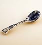 GZHEL TABLE SPOON [Dimensions: 4.8"x1.2"(3x12 cm). Material: porcelain. Hand-painted] [Gzhel, a type of porcelain decorated with paintings depicting country life in dark blue ink, derives its name from a picturesque Moscow region. Each painting is unique and tells a story, true accounts as well as fairytales, and combines beauty and fantasy in its own unique style. These cobalt blue paintings are made to last forever and are protected by a glaze to ensure their durability. They possess a remarkable ability to attract and entrance people with their unique artwork. All paintings are done individually by hand. In addition to being suitable for a wide variety of everyday uses, Gzhel objects are often used today to decorate homes]