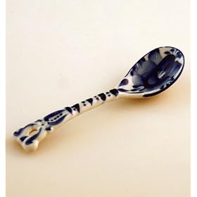 GZHEL TABLE SPOON [Dimensions: 4.8"x1.2"(3x12 cm). Material: porcelain. Hand-painted] [Gzhel, a type of porcelain decorated with paintings depicting country life in dark blue ink, derives its name from a picturesque Moscow region. Each painting is unique and tells a story, true accounts as well as fairytales, and combines beauty and fantasy in its own unique style. These cobalt blue paintings are made to last forever and are protected by a glaze to ensure their durability. They possess a remarkable ability to attract and entrance people with their unique artwork. All paintings are done individually by hand. In addition to being suitable for a wide variety of everyday uses, Gzhel objects are often used today to decorate homes]