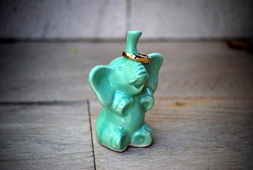 Handmade ceramic elephant ring holder in mint green