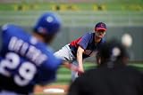 Surprise, AZ - March 11: Cleveland Indians v Texas Rangers - Derek Holland Photographic Poster Print by Kevork Djansezian, 12x18