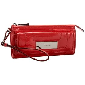 Buy Calvin Klein Patent Padding Wristlet by Calvin Klein