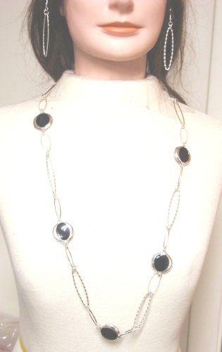 Click here to buy Sterling Silver with Flat Onyx Disc Perry Francois Long Chain Necklace and Earrings.