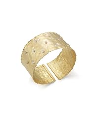 I. Reiss 14K gold cuff bracelet, set with bezel diamonds.