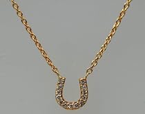 18kt Rose Gold Diamond Horse Shoe Pendant on a 16" Chain. 18kt Rose Gold Diamond Horse Shoe Pendant on a 16" Chain.