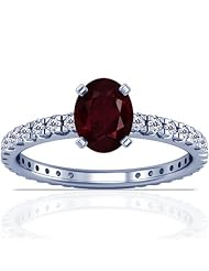Platinum Oval Cut Ruby Ring With Sidestones