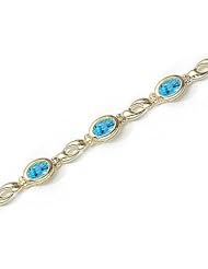 14kt Yellow Gold Oval Blue Topaz Bracelet.