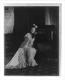 Historic Print XL Advertisement for RCA Victor Young woman seated
with hands against phonograph