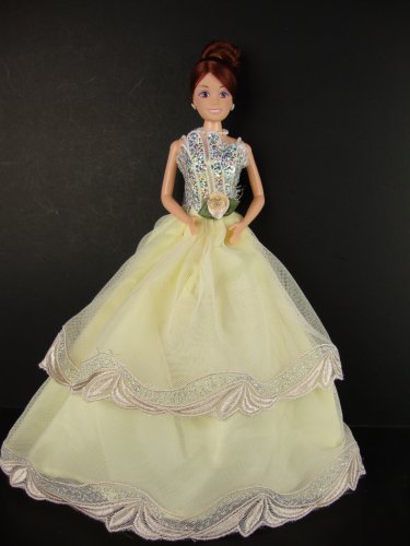 Yellow Ball Gown with Silver Sequins on the Botice Made to Fit the Barbie Doll