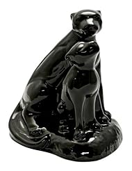 From Amazon.com. Click for details:
 Home Improvement: Haeger Potteries Black Cheetah and Cub Ceramic Sculpture - Universal Lighting and Decor Home Improvement: Haeger Potteries Black Cheetah and Cub Ceramic Sculpture - Universal Lighting and Decor