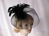 Superb Black Fascinator set on Juliet cap with veiling , and feather tendrils On Clips can be worn with seperate Alice band ,Perfect for Wedding ,Ladies day ,christening ,Ascot or any Special occasion .