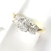 14K Two-Tone Gold Oval Cut Diamond Three-Stone Ring - 1.50 Ct.