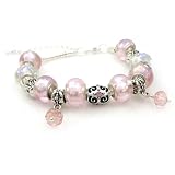 Designer-created Iridescent Pink Foil Lampwork Bead 