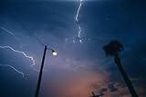 Lightning during a Thunderstorm in Madeira Beach Wall Mural - 24 Inches W x 16 Inches H - Peel and Stick Removable Graphic