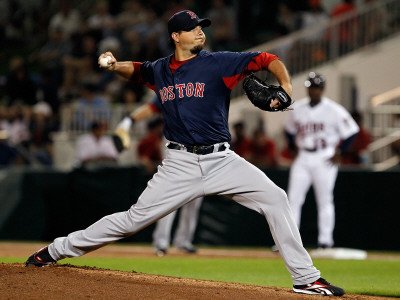 Boston Red Sox v Minnesota Twins, FORT MYERS, FL - FEBRUARY 27: Josh Beckett Photographic Poster Print by J. Meric, 9x12