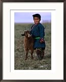Boy Wearing Traditional Dell Standing Next to Baby Goat, Mongolia Framed Photographic Poster Print by Jerry Galea, 21x29