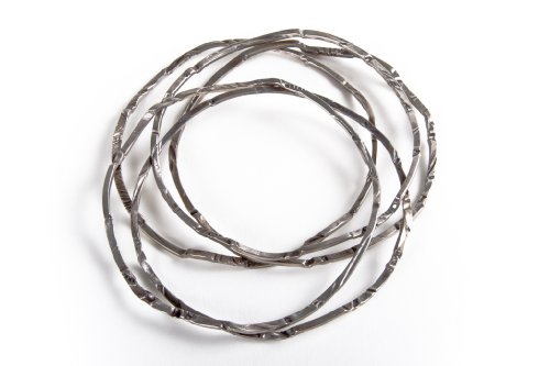 Click here to buy Imprint Bangles Bracelets by Cinzia Optical.