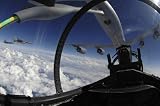 Wallmonkeys Peel and Stick Wall Decals - The Refueling Boom from a Kc-135 Stratotanker Arches over an F-15 Eagle as It Refuels the Aircraft. - 18