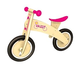 pink wooden balance bike