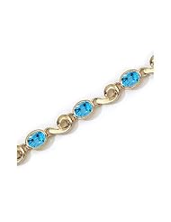 14K Yellow Gold Oval Blue Topaz Bracelet by Jewelry Mountain