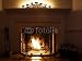 Wallmonkeys Peel and Stick Wall Decals - Fireplace with Burning Logs and Candles on the Mantle - Removable Graphic