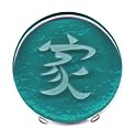 Nancy Gong's Art Glass Blessing, Calligraphy Translates to "A Home; A Family," Hand Cast and Carved on 5" Diameter X 3/4" thick Emerald Green Glass. Freestanding desktop display.