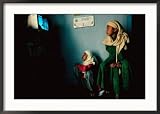Muslim Girls Relax Watching Television, Indonesia Framed Photographic Poster Print by Gregory Adams, 35x25