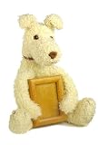 Picture frame held by 10 inch high fluffy seated dog