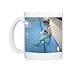 Pregnant woman in a swimming pool Photo Mugs