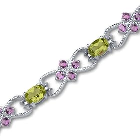 Delicate Filigree Design 6.75 carats total weight Oval and Round Cut Peridot... by