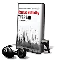 The Road [With Earbuds] (Playaway Adult Fiction)
